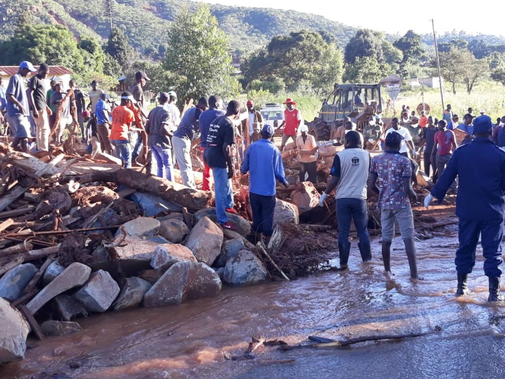 Working together to uncover dead bodies in Ngangu, Zimbabwe